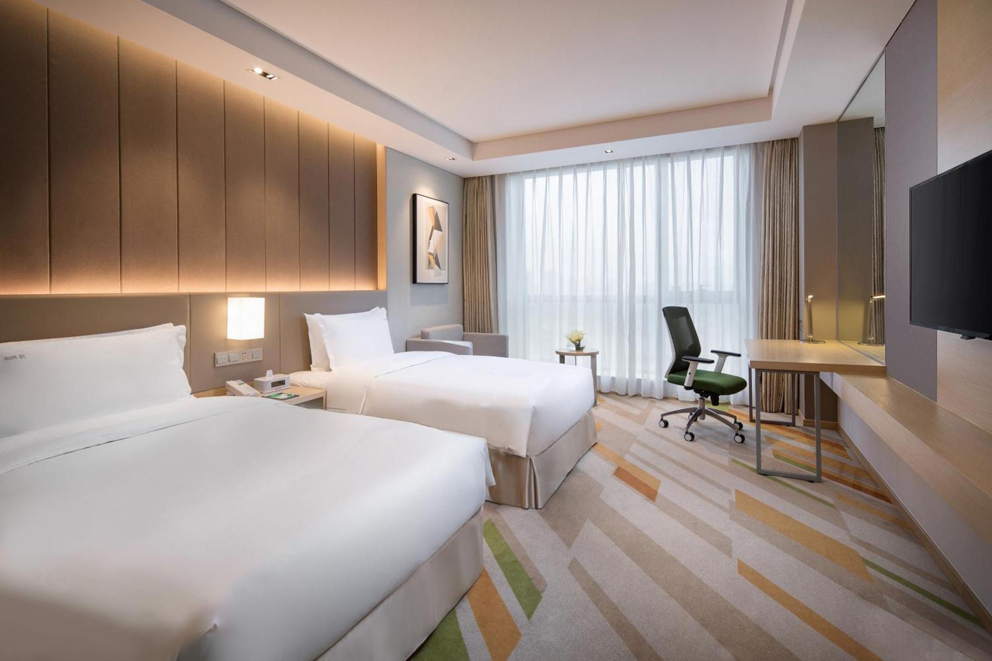 Holiday Inn Wuxi Taihu New City By Ihg ภายนอก รูปภาพ